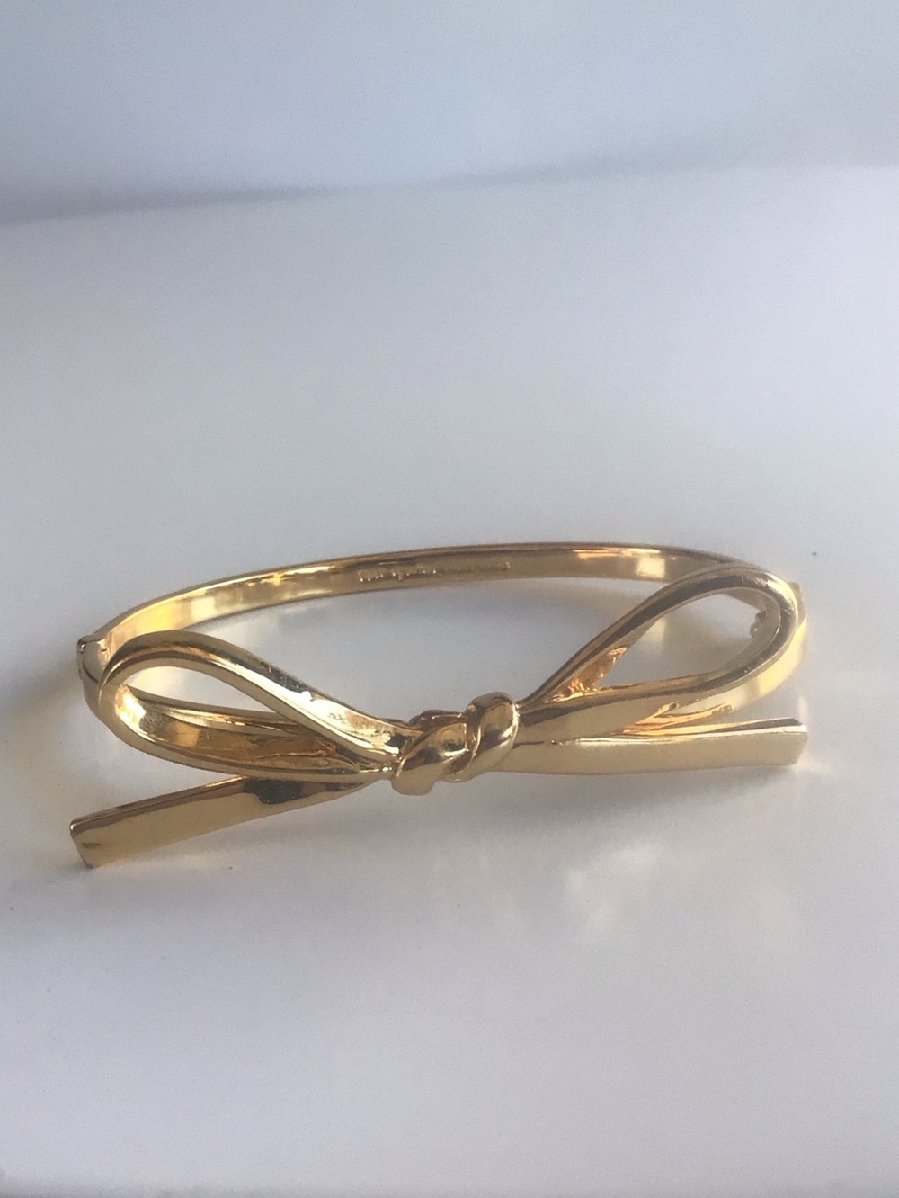 Kate Spade gold bow thin bracelet